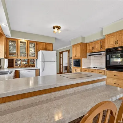 Brick bungalow with river views in Tracadie